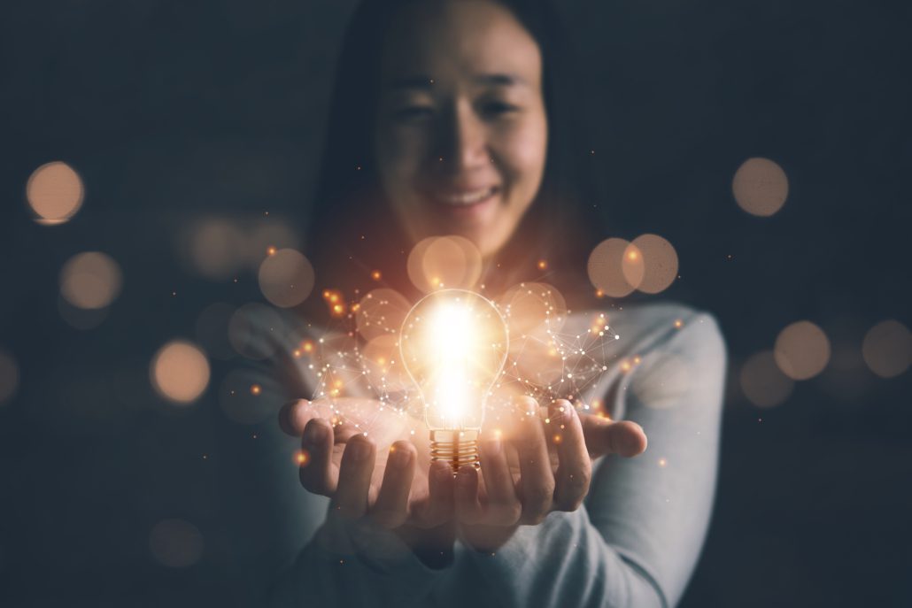 Concept,Of,Creativity,With,Bulbs,That,Shine,Glitter.hand,Of,Businesswoman